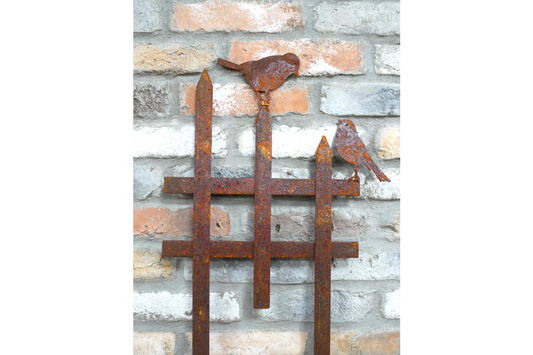 Rusty Fence With Birds Stake