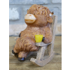 Highland Cow On Rocking Chair