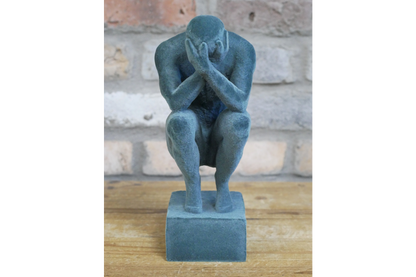 Man With Head In Hands