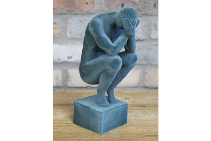 Man With Head In Hands