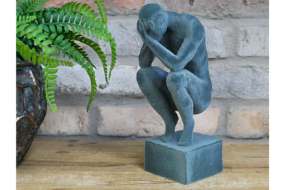 Man With Head In Hands