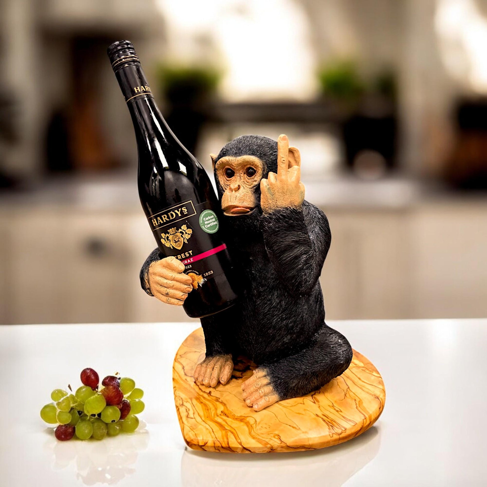 Black Up Yours Monkey Wine Bottle Holder with heart shape olive wood board